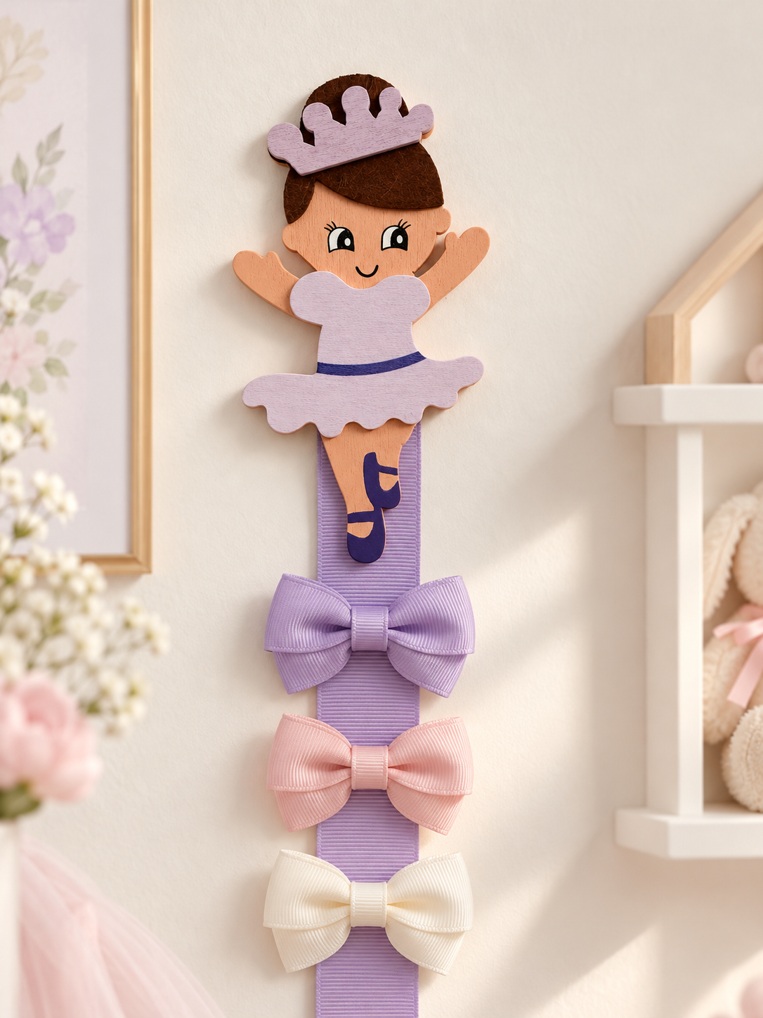 Front detail of wooden princess ballerina bow holder