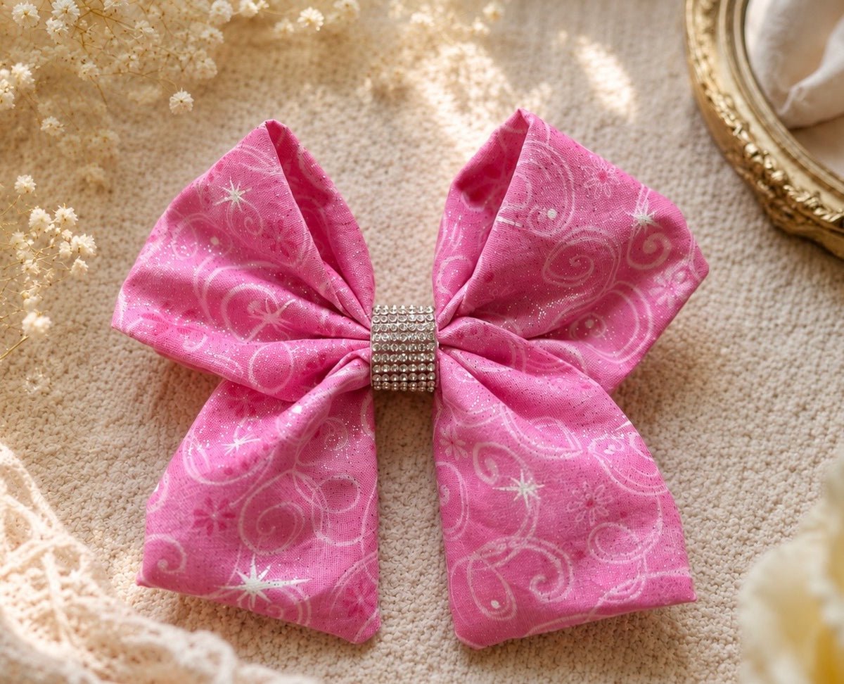 Front product view of Once Upon a Sparkle, 6-inch pink fabric hair bow