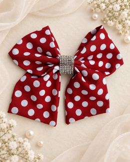 Red and white polka dot 6 inch hair bow with rhinestone center