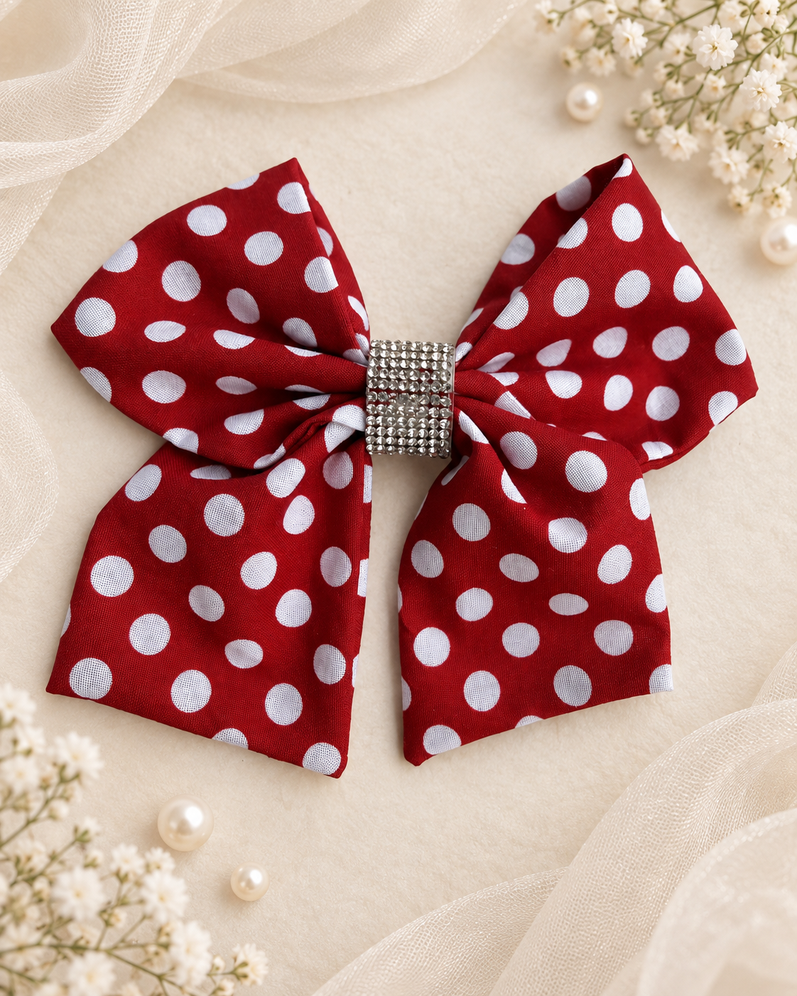 Red and white polka dot 6 inch hair bow with rhinestone center
