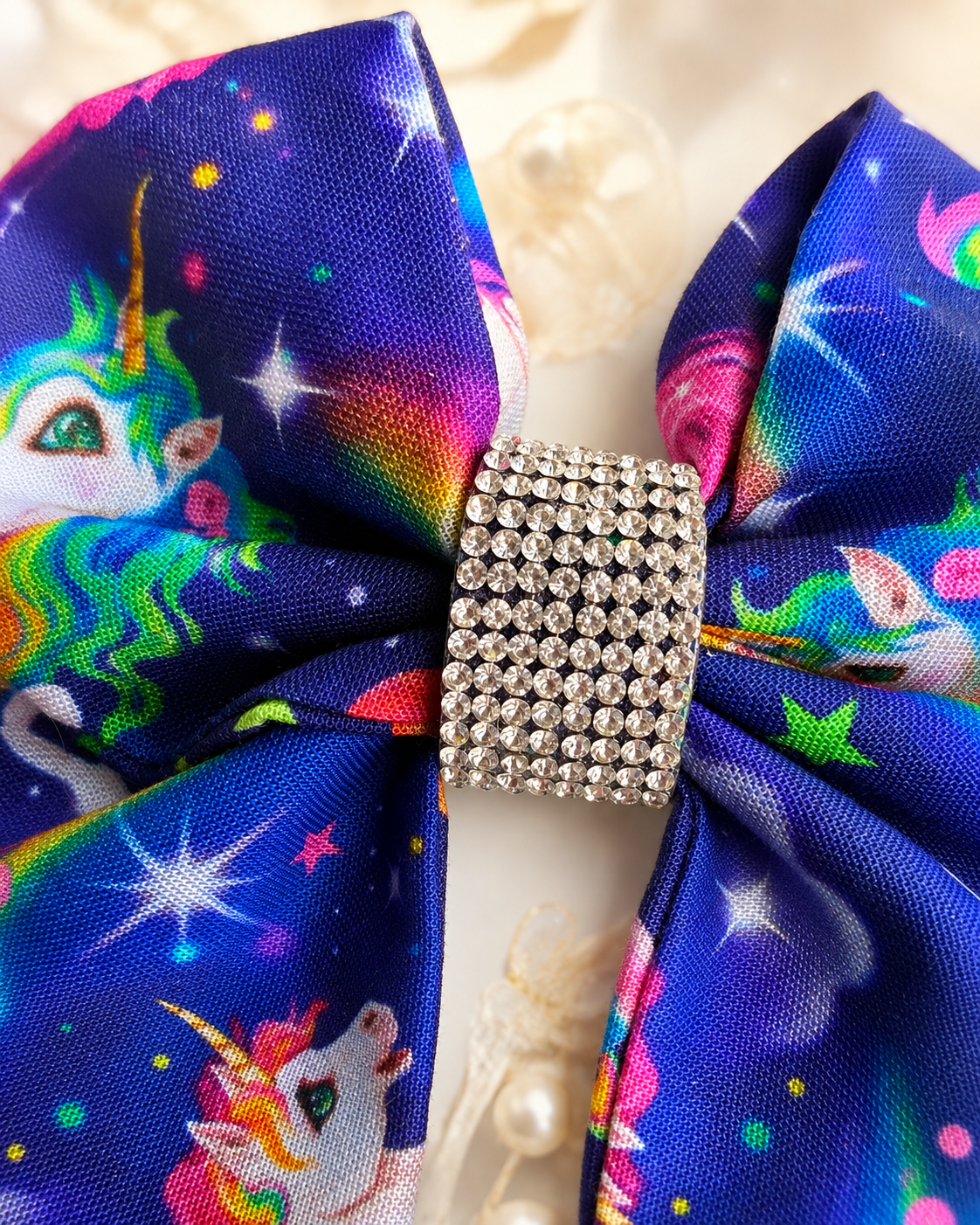 Girls unicorn statement hair bow with rainbow mane and galaxy print