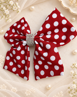 6 inch red and white polka dot hair bow with rhinestone center