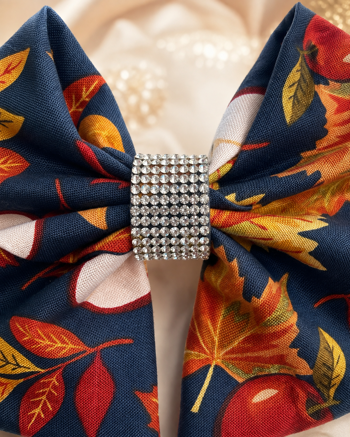 Close-up of Apple Orchard, 6-inch fall hair bow showing fabric and center detail