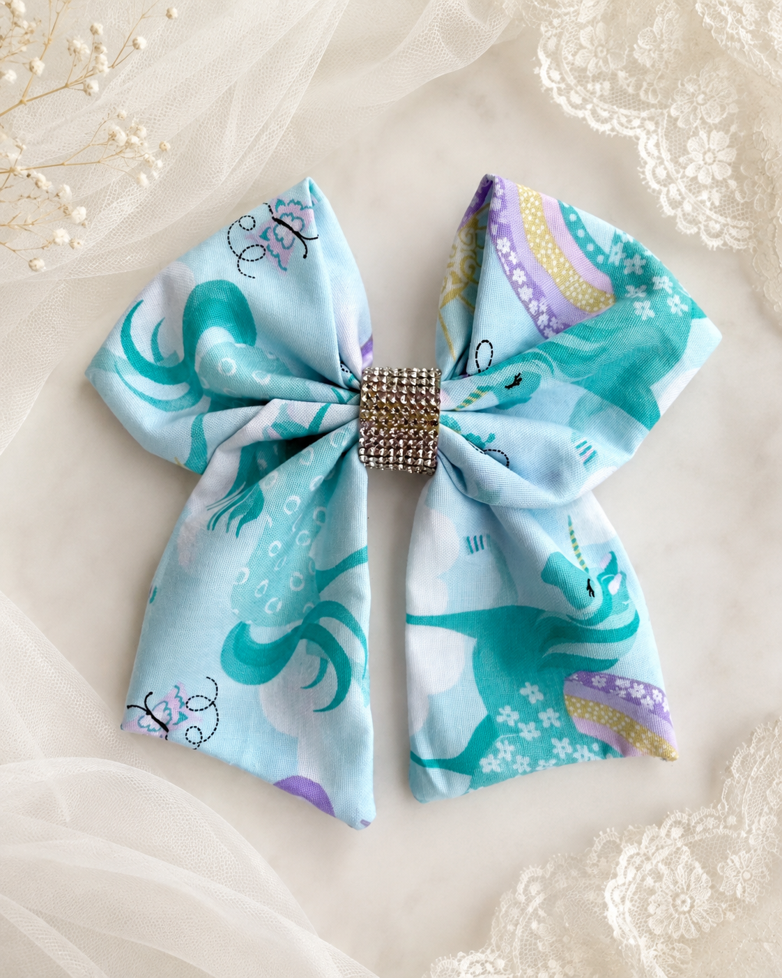 Light blue unicorn rainbow 6 inch hair bow with rhinestone center
