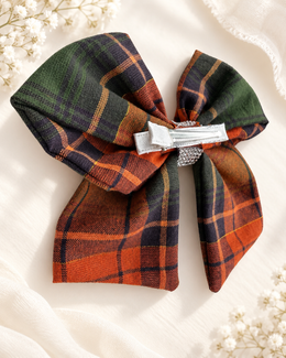 Large fall plaid hair bow with dark green orange tan and rhinestone center
