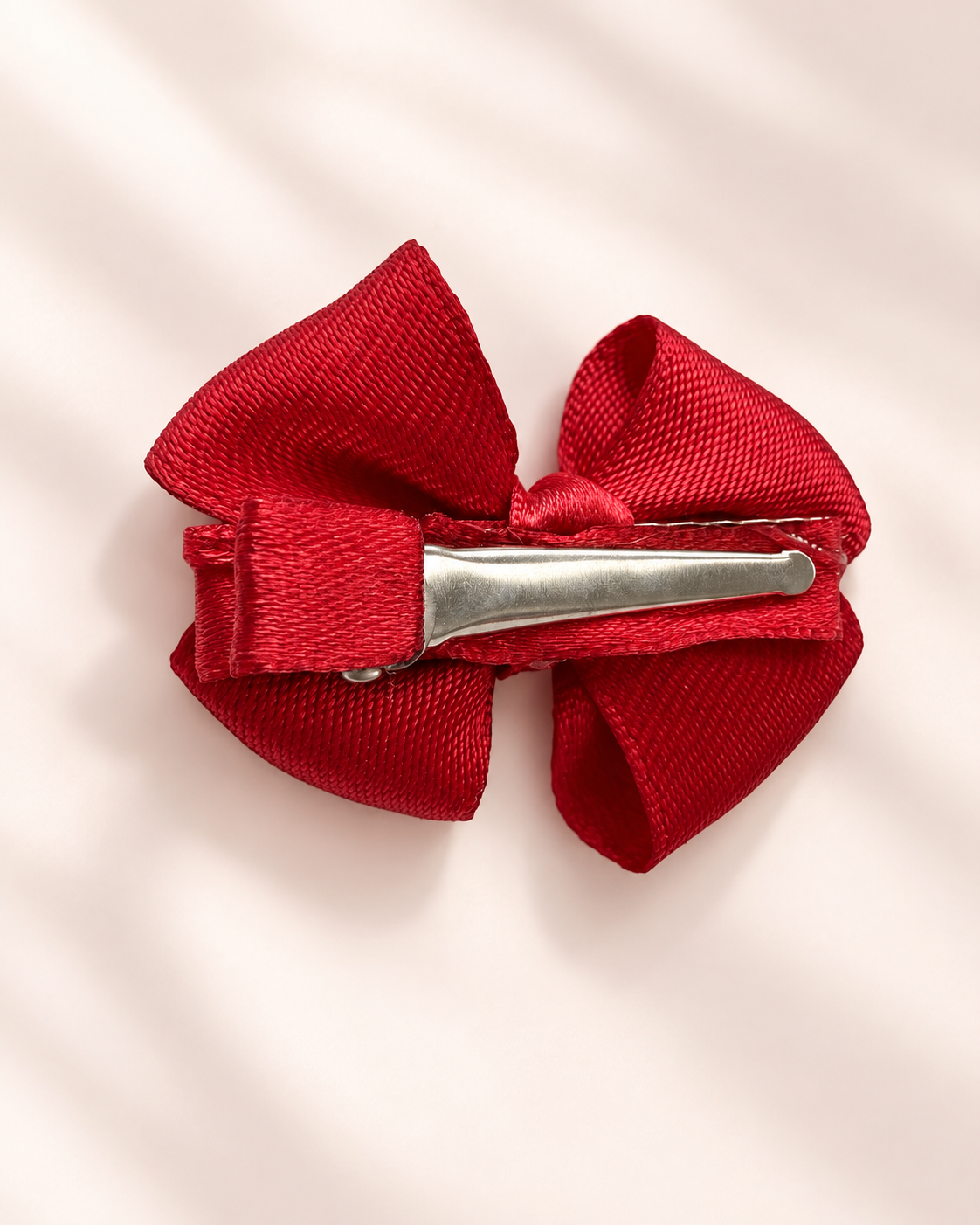 Back of Little Ruby mini hair bow showing non-slip alligator clip