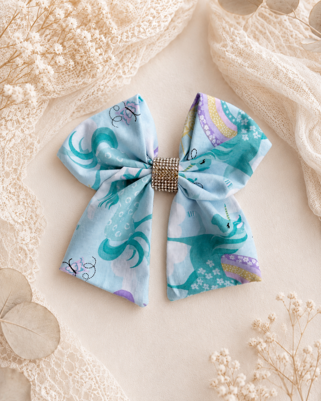 6 inch unicorn rainbow hair bow shown for size