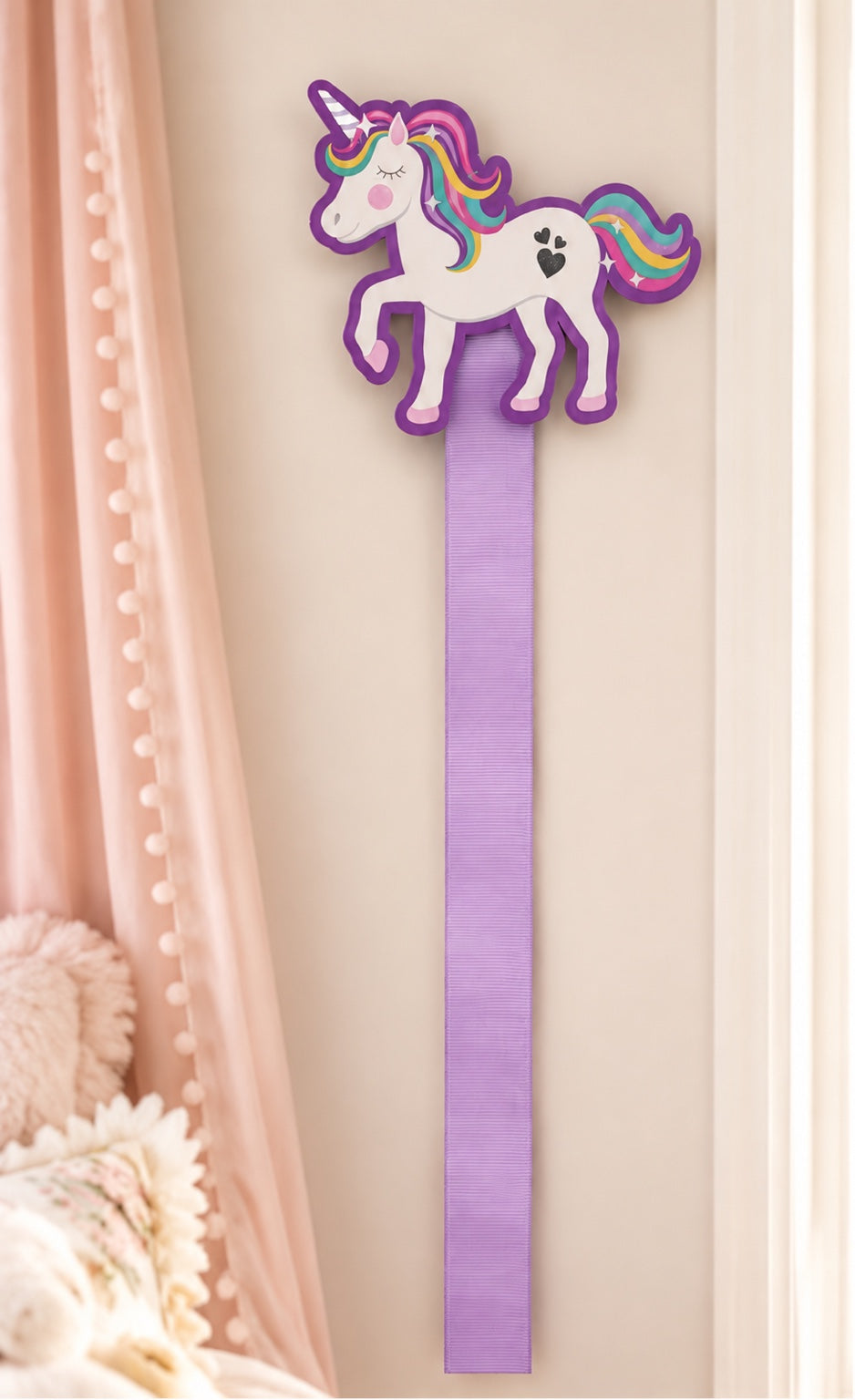 Rainbow unicorn bow holder with a 36-inch lavender ribbon displayed on a nursery wall