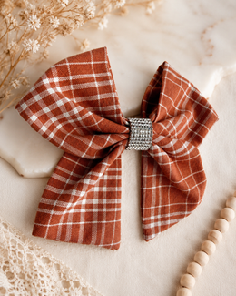 Rust and ivory plaid boutique bow with sparkling rhinestone center