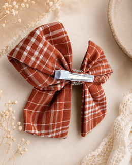 6 inch handmade plaid bow on a non-slip alligator clip 