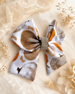 Boutique pumpkin hair bow in ivory taupe brown and orange