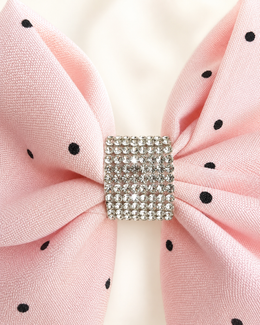 Angled product view of Blushing Dottie Bow, 6-inch blush pink polka-dot hair bow