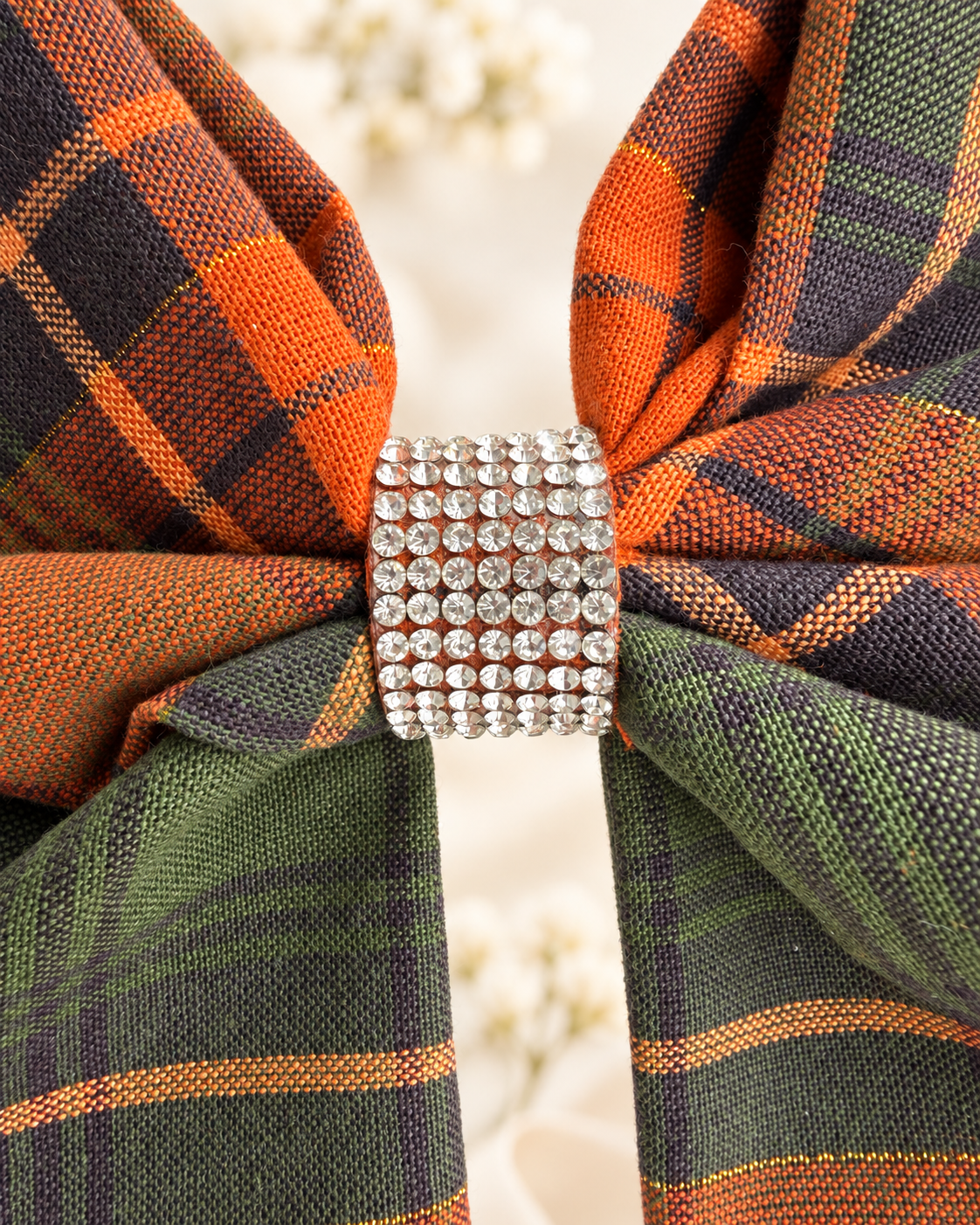 Orange green and tan plaid statement hair bow with rhinestone center