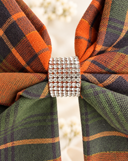 Orange green and tan plaid statement hair bow with rhinestone center