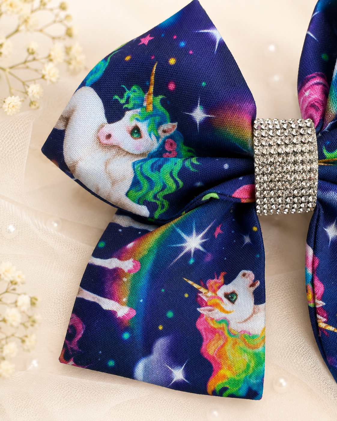 Navy unicorn boutique hair bow with colorful planets stars and rhinestone center