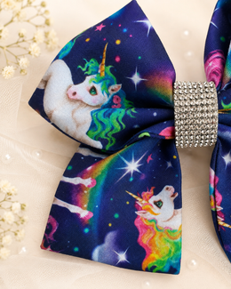 Navy unicorn boutique hair bow with colorful planets stars and rhinestone center
