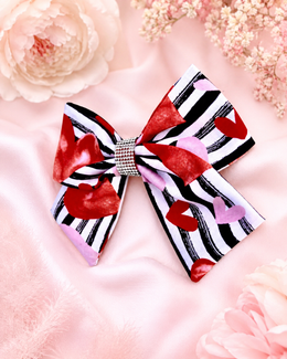 Close-up of Love in Paris, approximately 6-inch striped heart hair bow showing fabric and center detail
