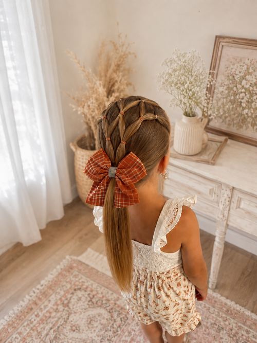 Autumn Plaid, hair bow for girls worn in a girl's hairstyle to show scale