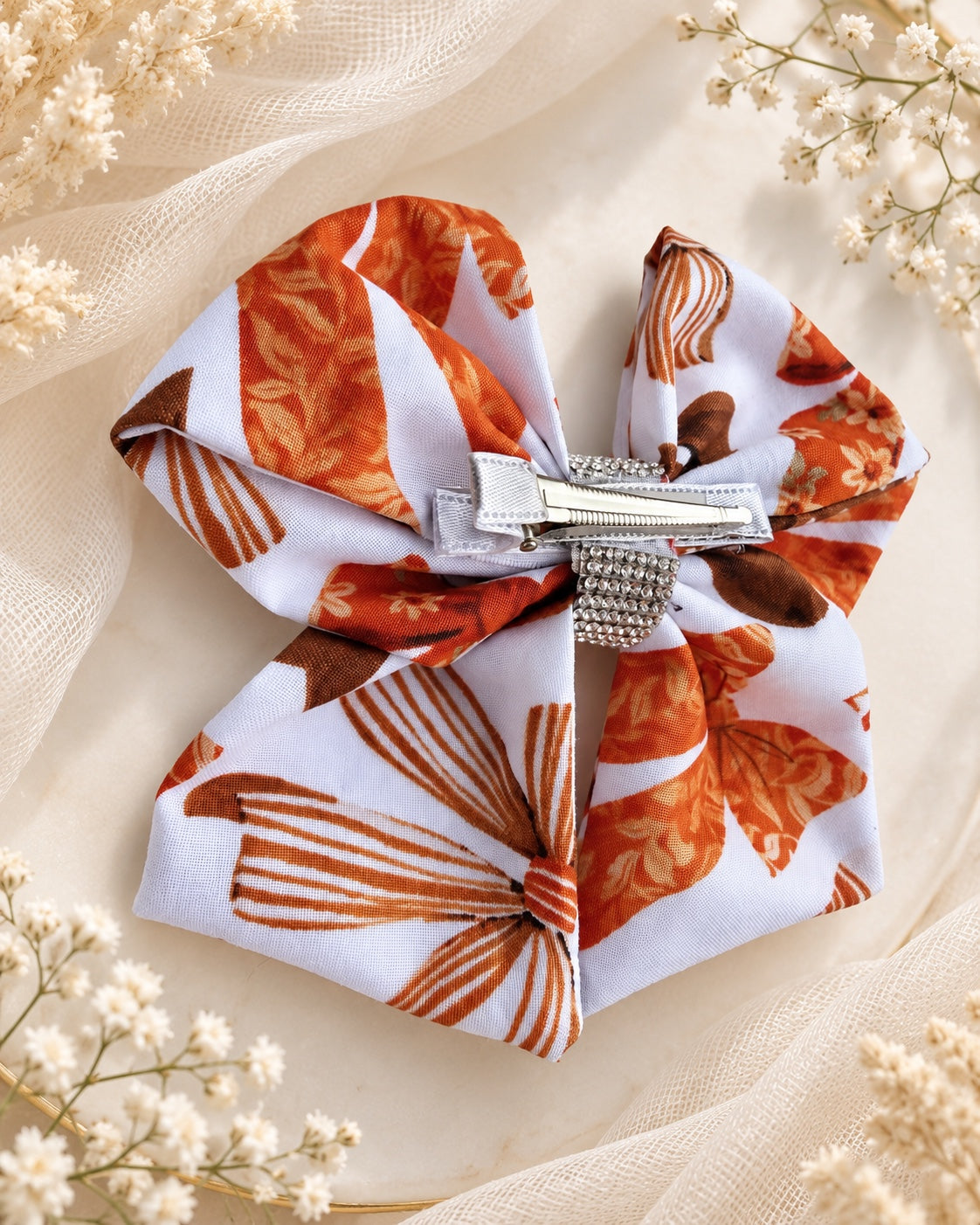 Back view of Autumn Ribbons 5.5 inch fall hair bow showing the alligator clip