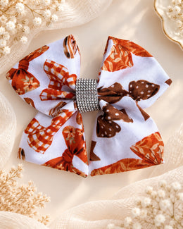 Front product view of Autumn Ribbons 5.5 inch girls fall hair bow with sparkling rhinestone center