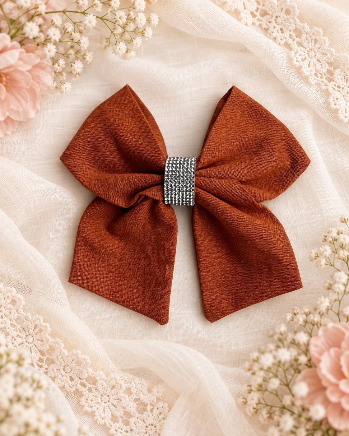 Burnt orange girls hair bow with sparkling rhinestone center