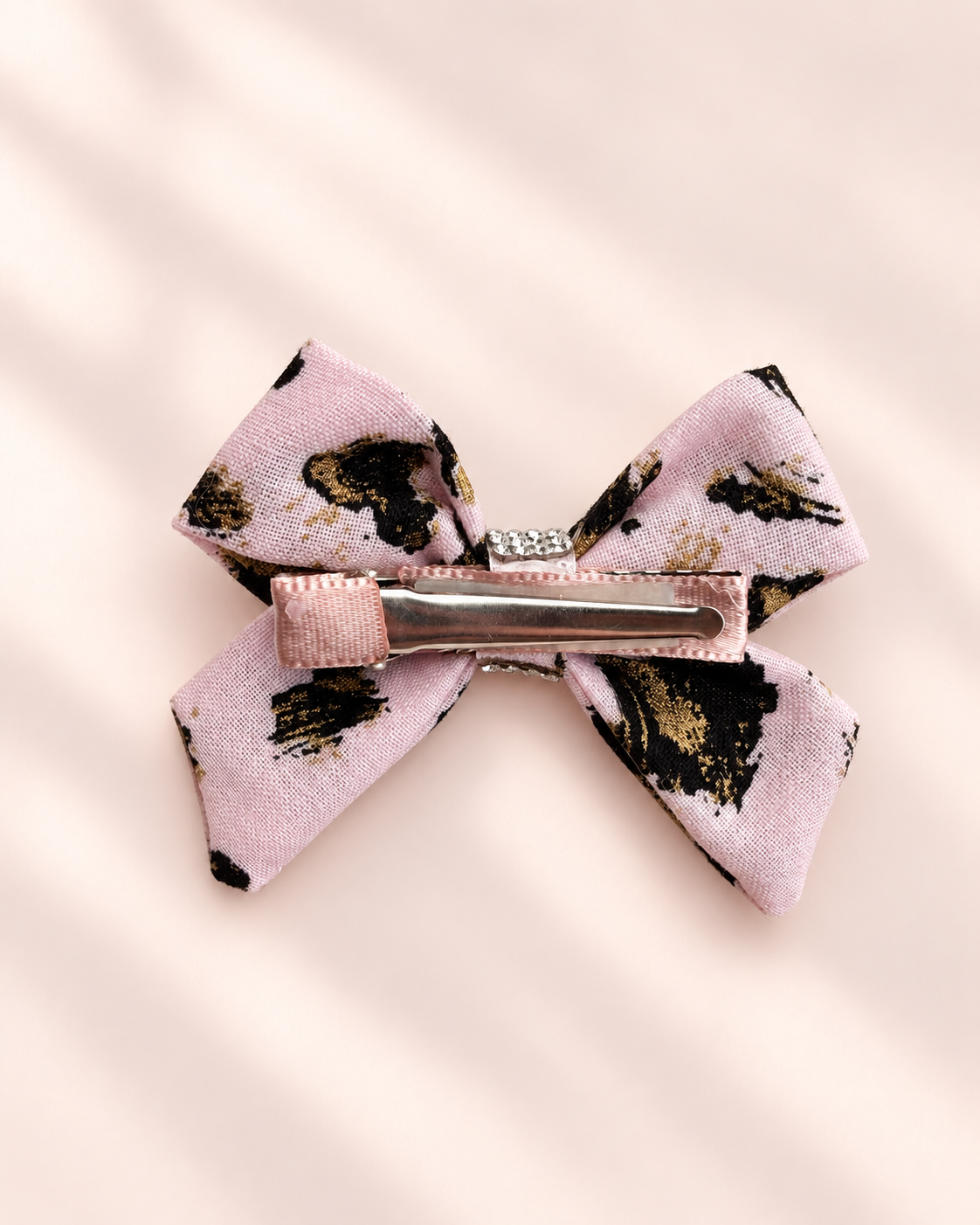 Back view of 3 inch Gilded Leopard hair bow showing blush wrapped alligator clip