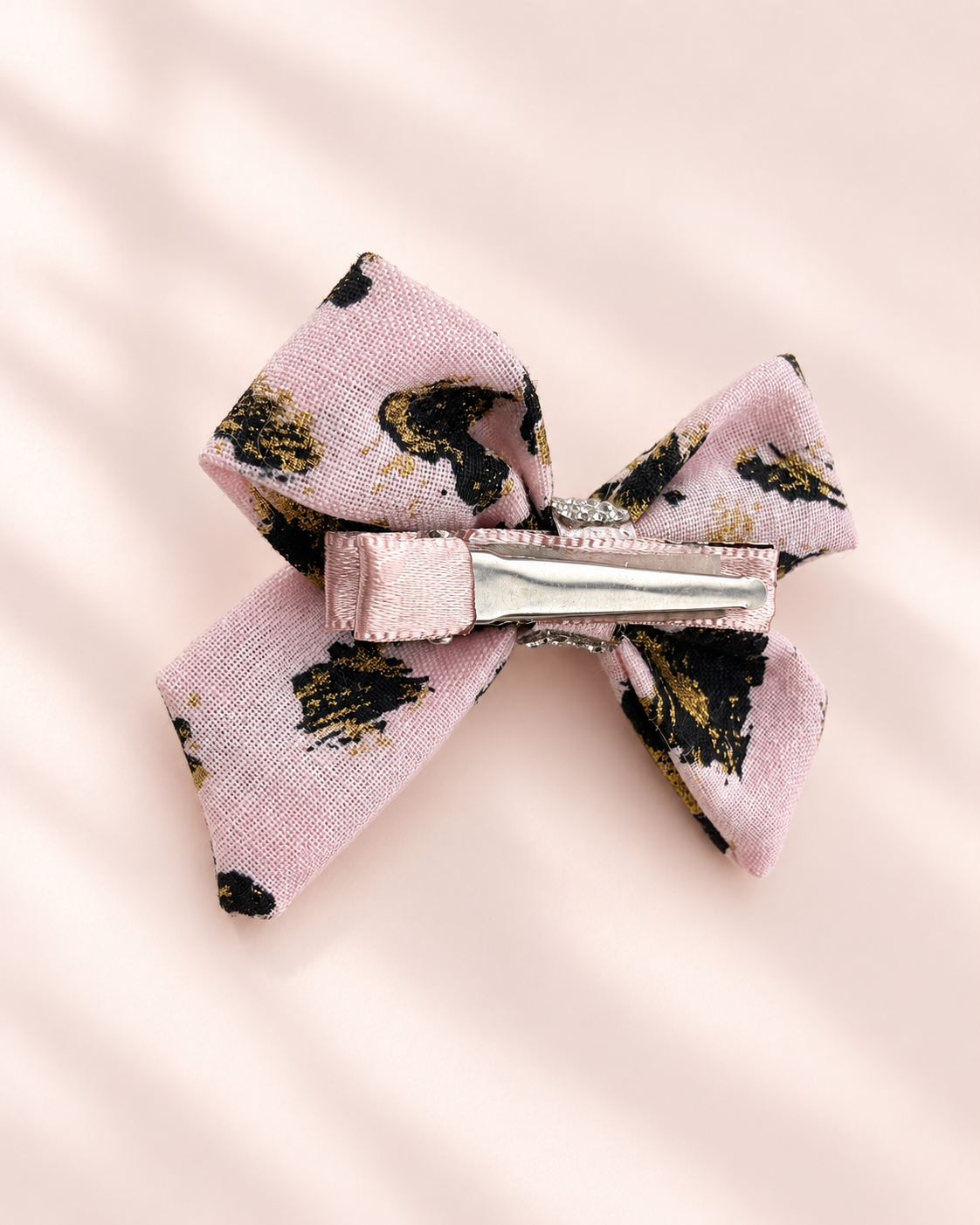 Detailed back view of 3 inch Gilded Leopard mini bow with alligator hair clip