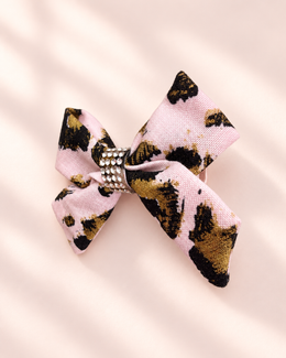 Close angled detail of 3 inch Gilded Leopard mini hair bow with sparkling rhinestone center