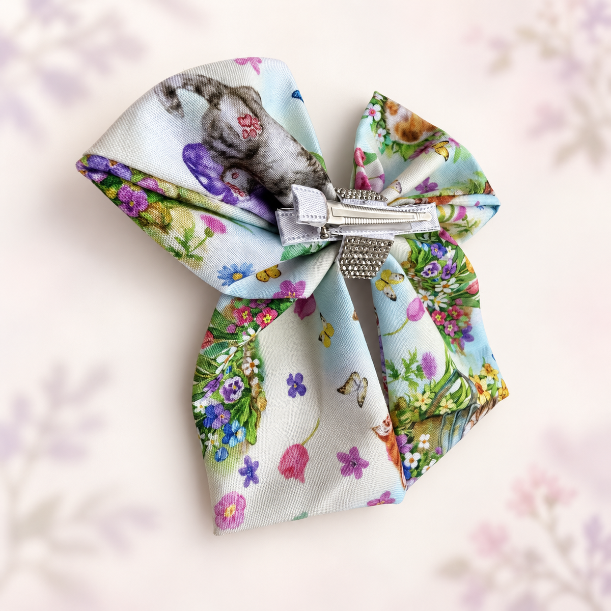 Back of kitten hair bow showing its non-slip alligator hair clip
