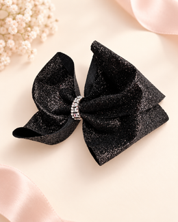 Black glitter girls hair bow with sparkling rhinestone center detail