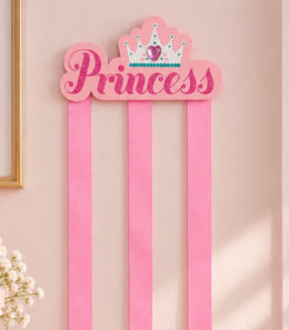 Pink Princess hair bow holder and three ribbons close-up